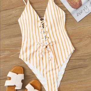 Yellow and white striped bathing suit